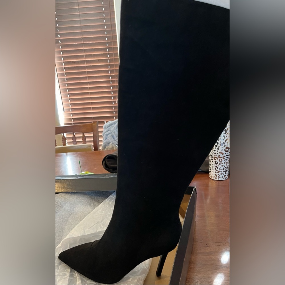 SOLD Black boots new in box